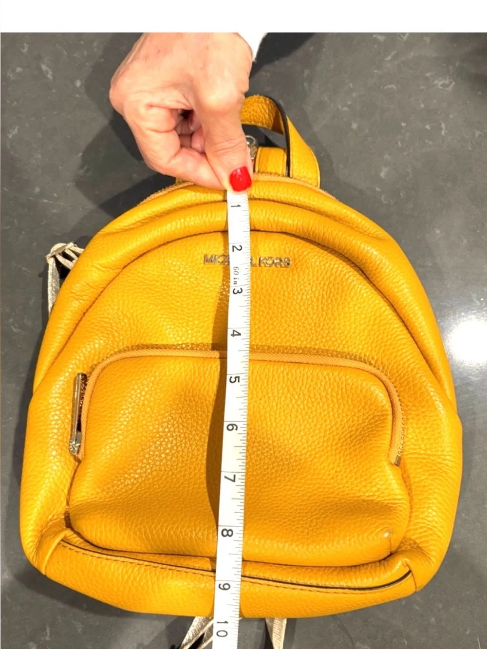 Michael Kors Mustard Yellow Pebbled Leather Mini Backpack
